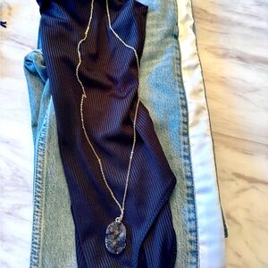 Gold-tone chain necklace with black drusy stone pendant